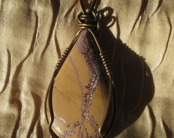 Sonoran Dendritic Cabochon wrapped with Antiqued Bronze Wire