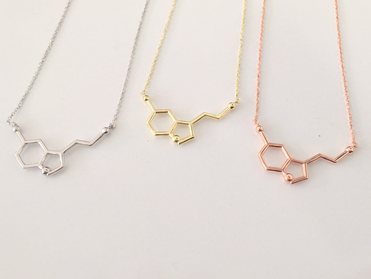 gold serotonin necklace