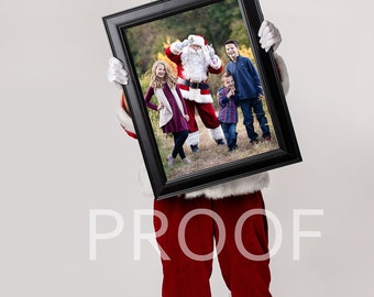 Imagen compuesta digital navideña de Santa sosteniendo un marco para Photoshop. Archivo PSD de máscara de capa de foto.
