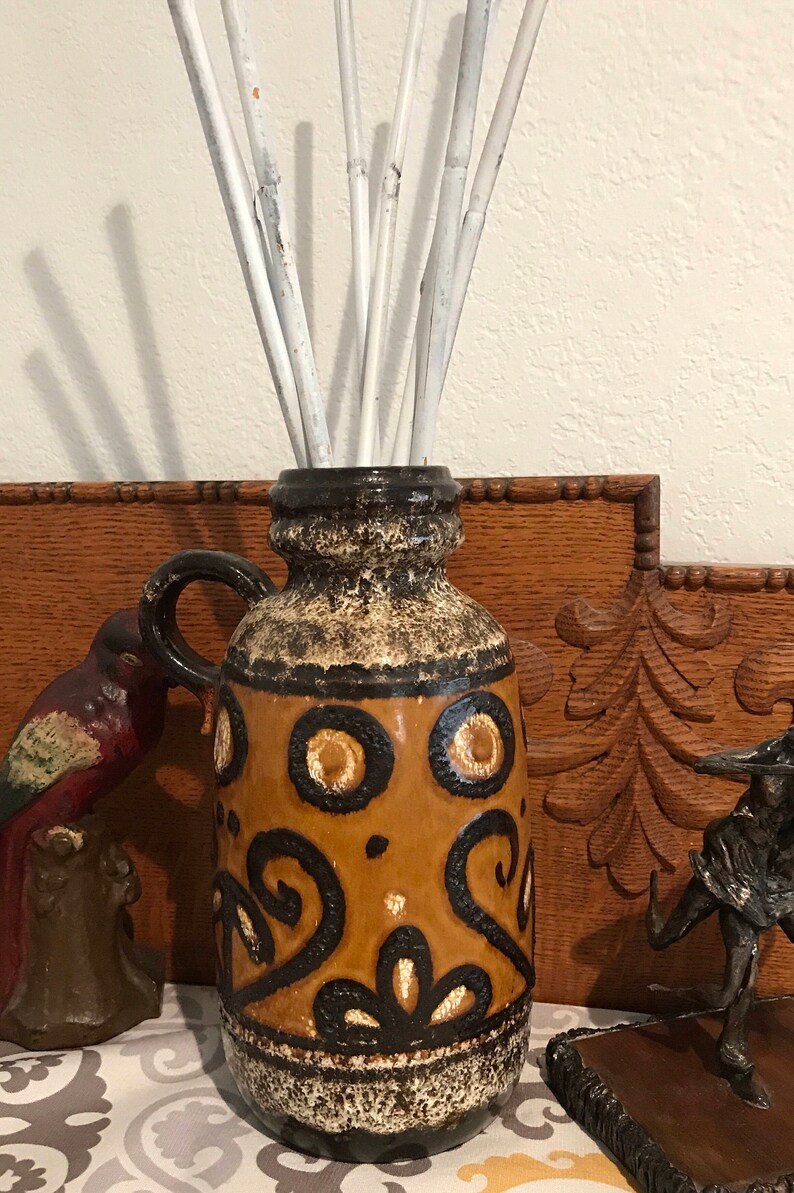 vase applied handle to one side fat lava glaze Retro vessel west German pottery warm earth tones