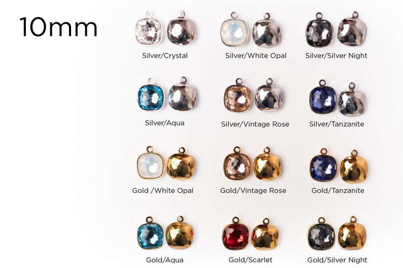 May include: Assortment of 10mm square glass charms with different colors and finishes. The charms are attached to silver and gold metal loops. The colors include crystal, white opal, silver night, aqua, vintage rose, tanzanite, scarlet.