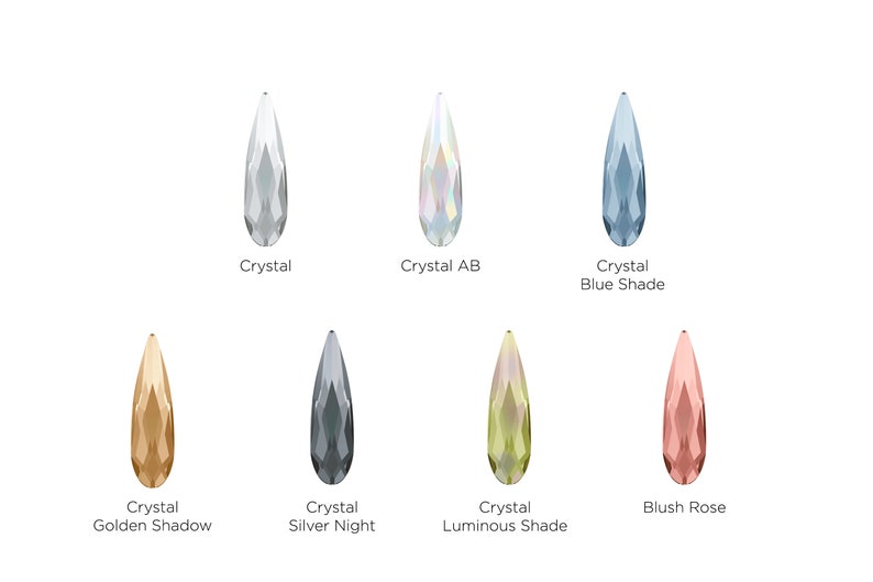 May include: A selection of teardrop-shaped crystal beads in various colors, including clear, iridescent, blue, gold, silver, green, and blush rose.