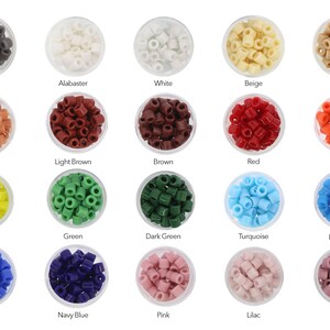May include: Assortment of 18 small round glass beads in various colors, displayed in clear plastic containers. The colors include grey, alabaster, white, beige, tan, rust, light brown, brown, red, orange, yellow, green, dark green, turquoise, light blue, blue, navy blue, pink, lilac, and purple.