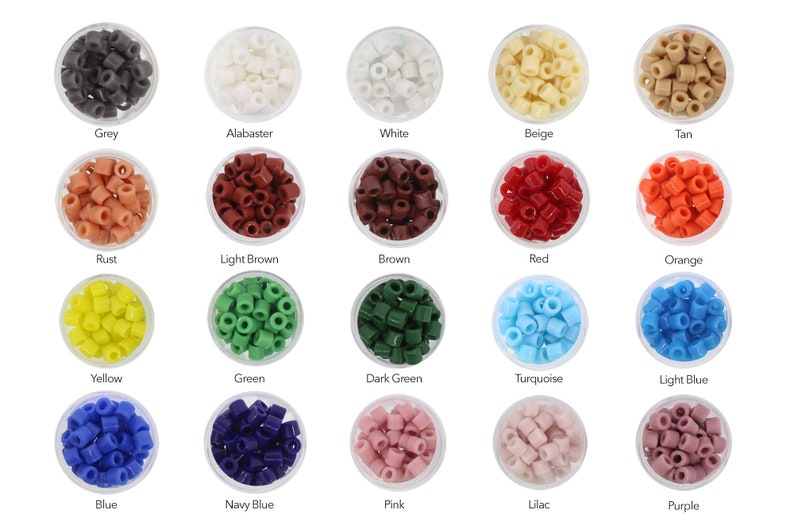 May include: Assortment of 18 small round glass beads in various colors, displayed in clear plastic containers. The colors include grey, alabaster, white, beige, tan, rust, light brown, brown, red, orange, yellow, green, dark green, turquoise, light blue, blue, navy blue, pink, lilac, and purple.