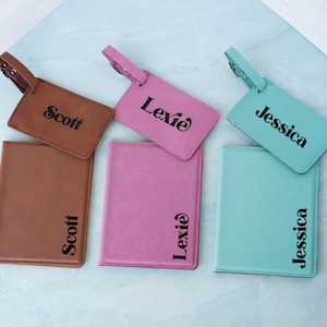 May include: Three personalized luggage tags with brown, pink, and turquoise leatherette. The tags are labeled "Scott", "Lexie", and "Jessica" in a retro font.