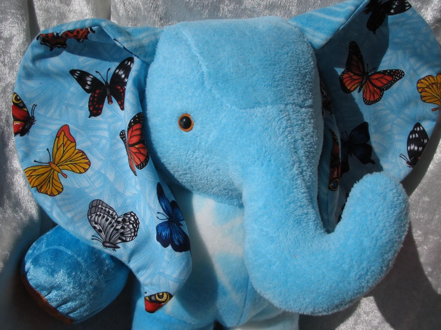 elephant toy that shoots butterflies