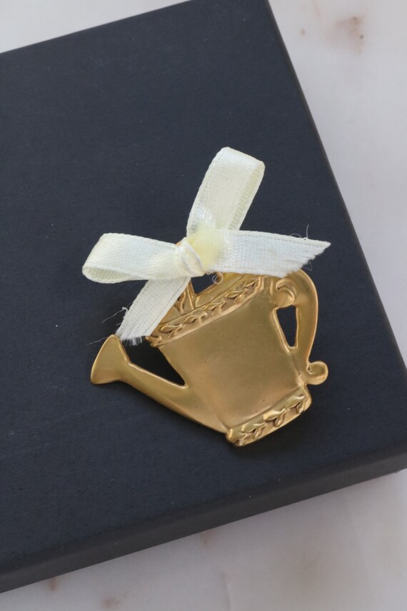 vintage gold watering can Gem