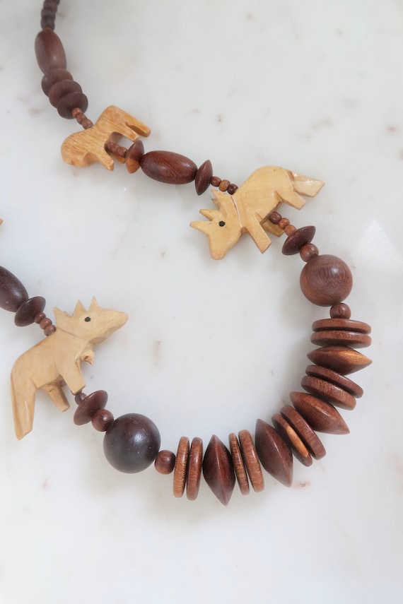 Vintage Wooden Bead Necklace - Rhino and Lion Carv