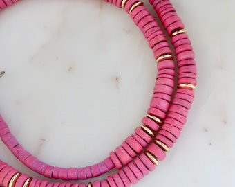 Collar vintage de cuentas de madera de color rosa