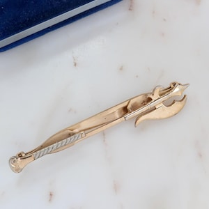 Vintage Anson gouden bijl met striksluiting