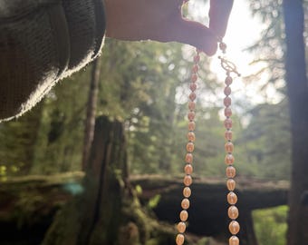 Freshwater Pearl Necklace: Blush pink pearl and blue glass accented, 18 inch
