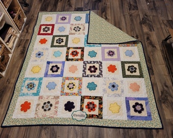 Custom Memory Quilts made from lost loved one's clothing; rag quilts, blankets, remembrance, grief, death