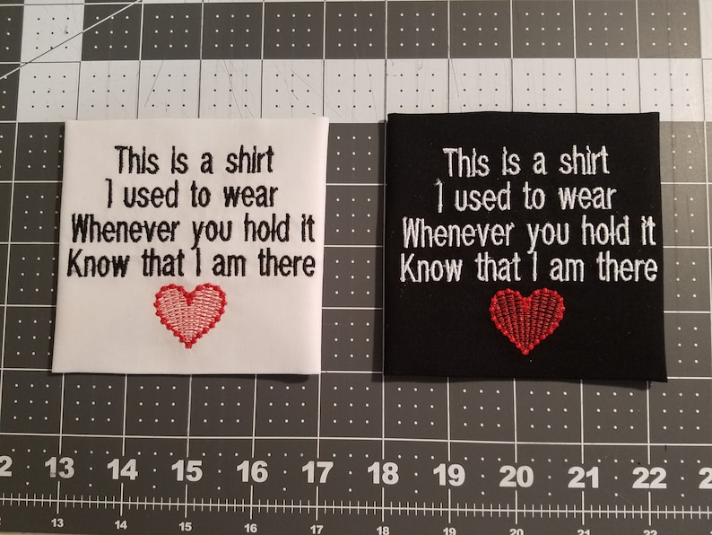 May include: Two embroidered patches, one white and one black, with the text "This is a shirt I used to wear Whenever you hold it Know that I am there" and a red heart in the centre.