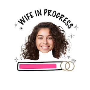 May include: A graphic design featuring the text WIFE IN PROGRESS in black letters, surrounded by small star icons. Below the text is a smiling person with curly brown hair, positioned above a pink loading bar and two gold rings with a diamond.