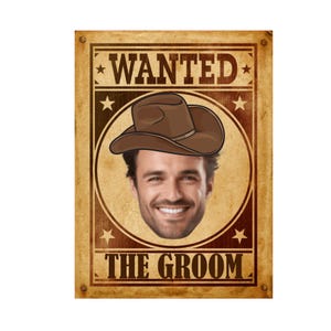 May include: A rectangular poster with a distressed tan background featuring the text WANTED at the top and THE GROOM at the bottom. In the center, a circular frame contains a photograph of a smiling person wearing a brown cowboy hat.