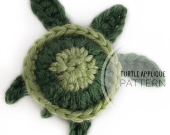 May include: A handmade crochet turtle applique in shades of green. The turtle has a circular body with a textured pattern, four flipper-like limbs, and a detailed head. The text "TURTLE APPLIQUE PATTERN" is visible.