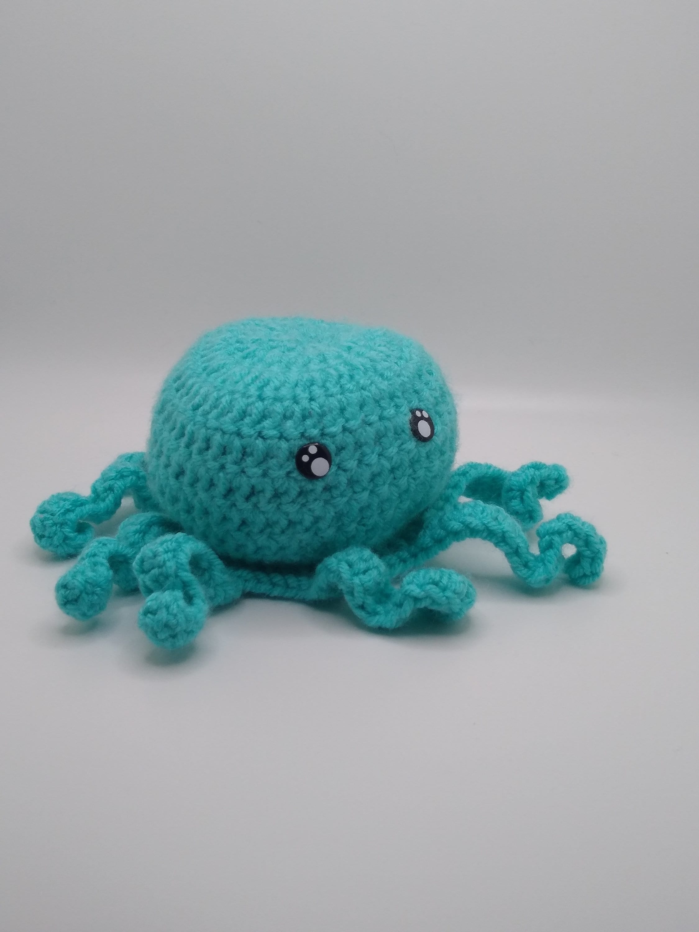turquoise amigurumi octopus plushy - Thumbnail 4