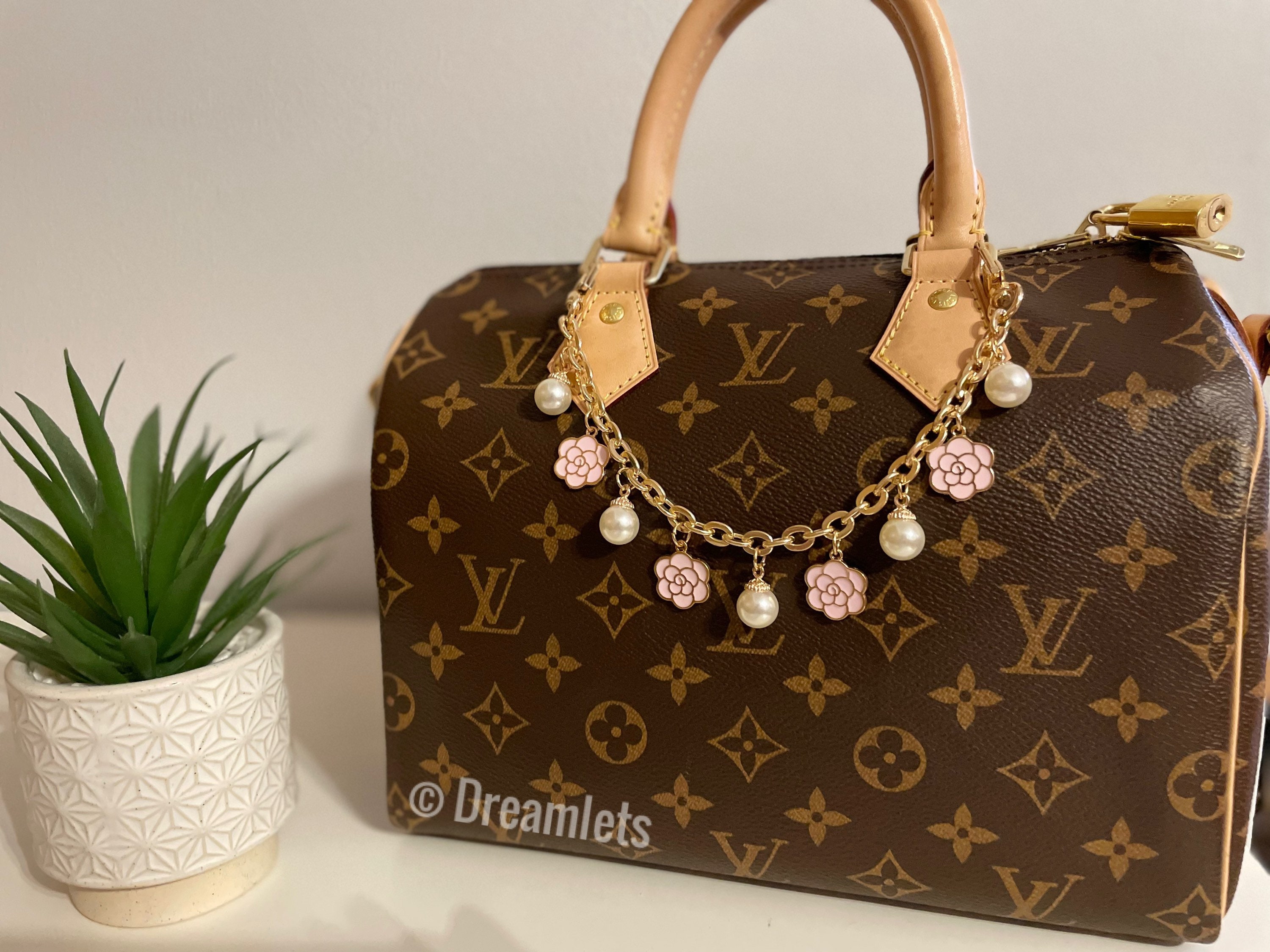 Louis Vuitton Monogram Baby Doe Bag Charm - Brown Keychains, Accessories -  LOU730516