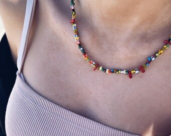 Necklace with colored resin beads and coral chips