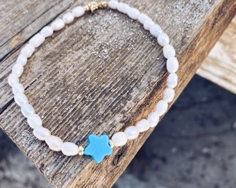 Anklets with freshwater pearls and a central stone star