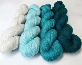 4 Full Skein Coastside Fingering Gradient in Teal with Very Light Gray