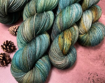 Coastside Sock Merino Hand Dyed Yarn Shades of Teal and Cognac and Brown