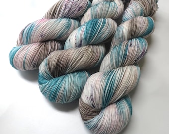 Hand Dyed KM Fingering Sock Yarn Superwash Merino Wool Nylon in Teal, Pink and Brown with Purple Speckles