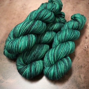 Hand Dyed Yarn DK Superwash Merino Wool  in Green and Navy Variegated