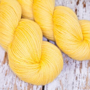 Hand Dyed Yarn KM Worsted Superwash Merino Wool  in Sunny Yellow