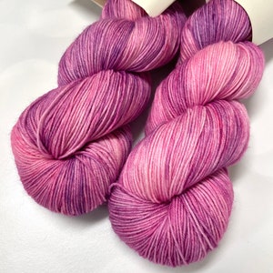 Hand Dyed KM Fingering Sock Yarn Superwash Merino Wool Nylon in Pinks and Purples