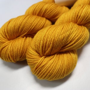 Hand Dyed Yarn KM Worsted Superwash Merino Wool  in Deep Yellow