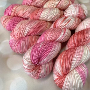 Coastside Sock Merino Hand Dyed Yarn in Shades of Pink and Peach