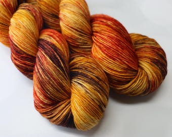 Hand Dyed KM Fingering Sock Yarn Superwash Merino Wool Nylon in Orange, Deep Brown, Red and Gold