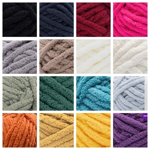 May include: A collection of 16 skeins of chunky yarn in various colours, including black, navy, burgundy, pink, grey, beige, white, light green, dark green, teal, light blue, orange, yellow, and purple.