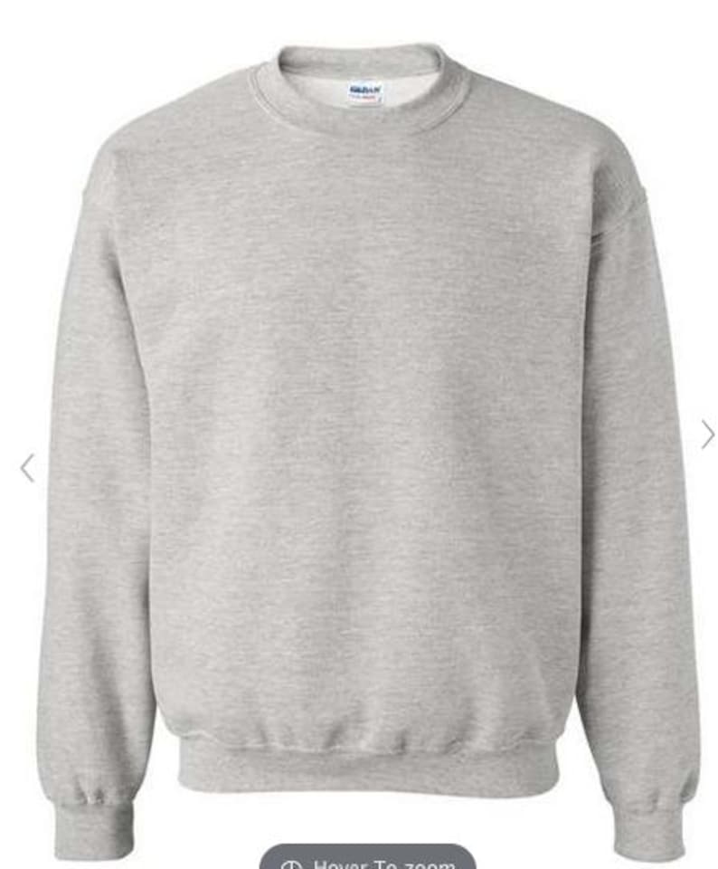 May include: A heather grey sweatshirt with a crew neck.