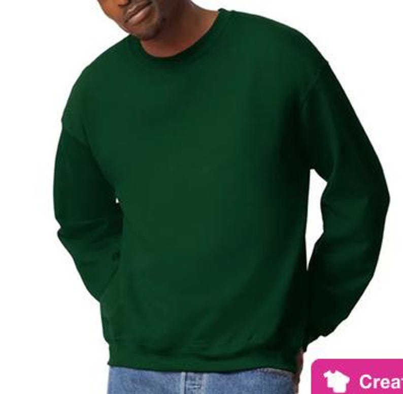 May include: A dark green crew neck sweatshirt with long sleeves.