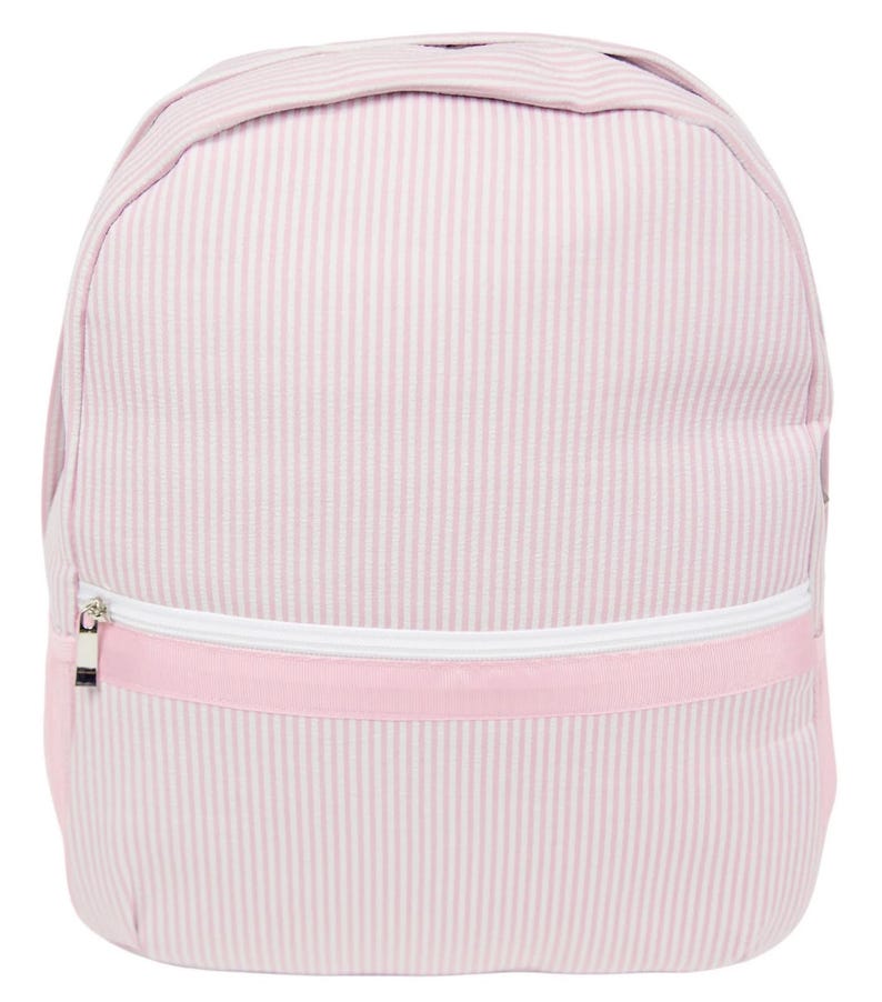 May include: A pink and white striped backpack with a white zipper and a pink accent band. The backpack has a rounded top and a simple, classic design, suitable for everyday use.