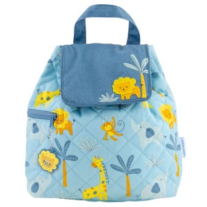 May include: Light blue quilted backpack with a jungle animal print. Features a top handle, front zip pocket, and flap closure. The design includes lions, elephants, giraffes, and monkeys. The backpack has a tag that says "ROAR".