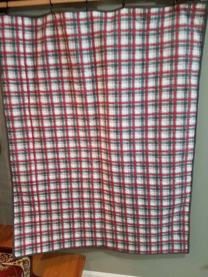 Super snuggle flannel quilted woodland baby quilt.