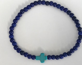 Bracelet perles bleu marine et croix turquoise