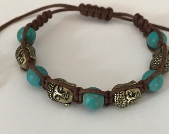 Bracelet tête de bouddha bronze, perles turquoises