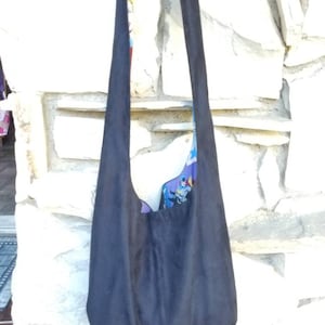 Custom suede hobo bag with your choice of lining material.  Suede hobo bag, super hero lined hobo bag, custom designed suede hobo bag, boho