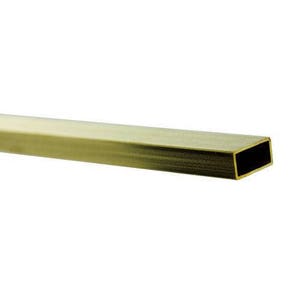 May include: A close-up of a gold-colored, rectangular brass tube.