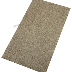 May include: A brown fabric-covered box with a white pull tab.