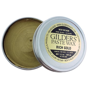 May include: A small tin of Gilders Paste Wax in Rich Gold. The tin is silver with black text that reads "Gilders Paste Wax Rich Gold Covers 100 sq/ft 9.2 sq/m Net 3.5 oz - 100 ml by volume  MFG by  N.E.C.  D-4236  W.L.S.V.  ASTM  D-4236  Conforms to Art Materials ASTM D-4236  Supplies & Products 800-825-0029 www.gilderspaste.com New Design Made in USA - 28 Colors".