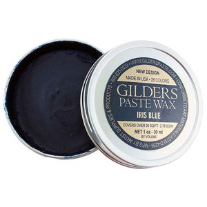 May include: A small tin of Gilders Paste Wax in Iris Blue. The tin is labeled with the brand name, product name, color, and size. It covers over 30 sq ft and contains 1 oz (30 ml) of wax.
