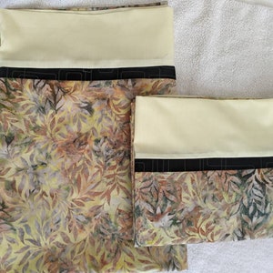 Set of two pillow cases, yellow to gold variegated leaves