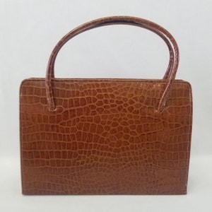 Brown crocodile handbags discount