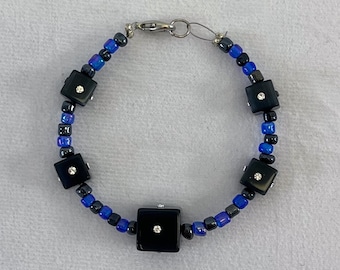 1990s Blue and Black Seed Bead Bracelet With Black and Clear Rhinestone Dice Beads