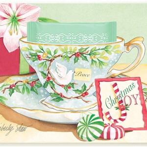 Tarjeta de felicitación Christmas Joy Teacup con una bolsita de té de menta real metida en el borde de la taza de té pintada